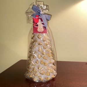 Christmas tree candle with gold accents